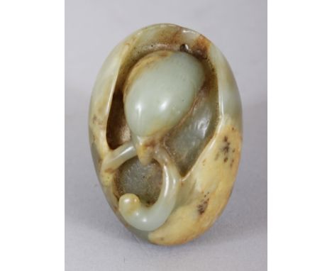 A CHINESE CELADON JADE-LIKE HARDSTONE MODEL OF A BIRD EMERGING FROM ITS SHELL, 2in wide & 1.25in high.