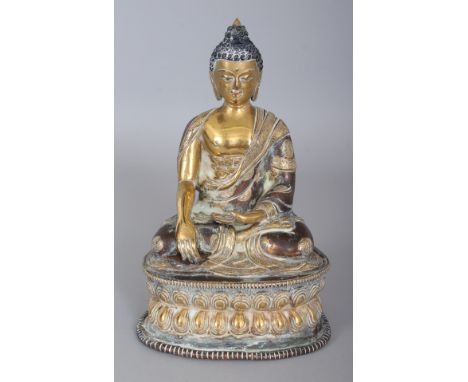 A TIBETAN POLISHED BRONZE FIGURE OF BUDDHA, seated in dhyanasana on a double lotus plinth, the base with a double vajra, 8.25