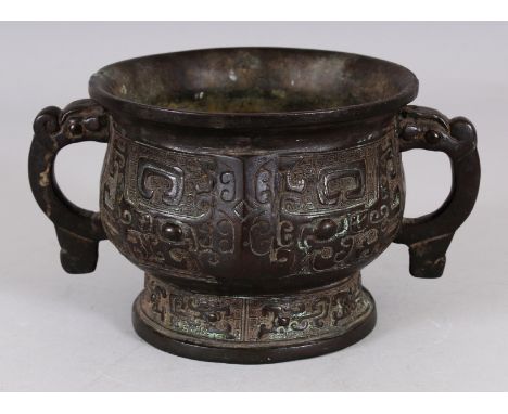 A CHINESE SHANG STYLE BRONZE CENSER, weighing approx. 1.36Kg, the sides cast with taotie masks, the interior faintly incised 
