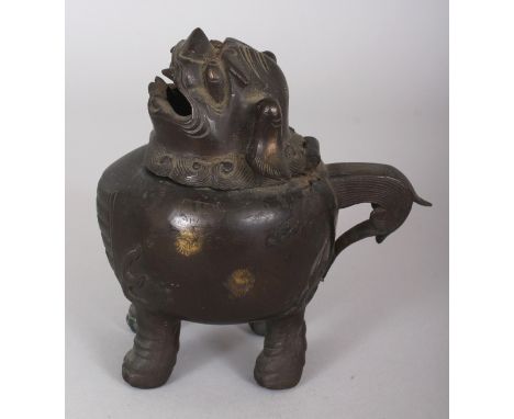 A CHINESE MING STYLE BUDDHISTIC LION BRONZE CENSER, the hinged head of the mythical animal forming the cover, 5.75in high.