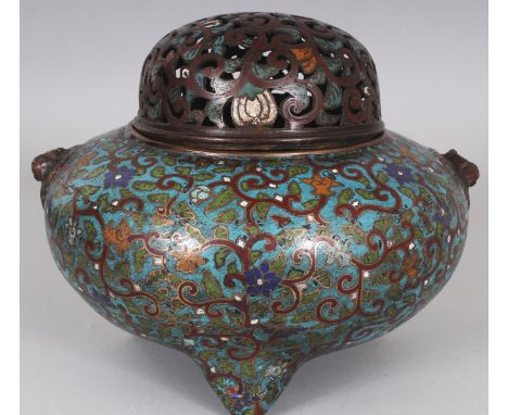 A GOOD QUALITY ORIENTAL MING STYLE CHAMPLEVE TRIPOD CENSER & PIERCED COVER, decorated with formal scrolling foliage, the base
