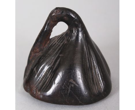 A JAPANESE CARVED WOOD NETSUKE OF A LOTUS POD, 1.6in high.