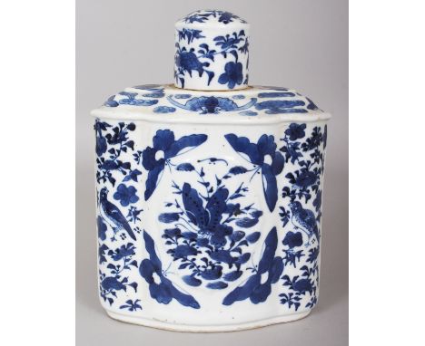 A 19TH CENTURY CHINESE QUATREFOIL SECTION BLUE & WHITE PORCELAIN TEA CADDY & COVER, painted with birds, butterflies and folia