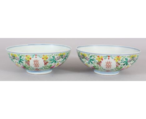 A PAIR OF 19TH CENTURY CHINESE FAMILLE ROSE PROVINCIAL PORCELAIN BOWLS, the sides painted with Shuangxi Double Happiness char