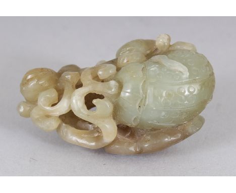 A SMALL CHINESE CELADON JADE GROUP, carved and pierced with a chilong, lingzhi and a squash, 2in wide.