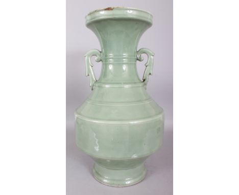 A LARGE 18TH/19TH CENTURY CHINESE CELADON PORCELAIN VASE, moulded with double scroll acanthus handles, the base unglazed, 18.