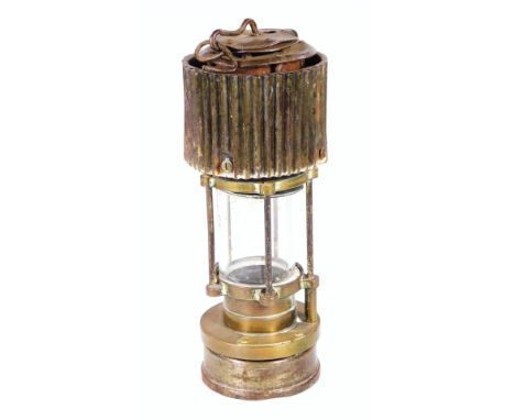 A mid 20thC HCP type Patterson miner's lamp, of cylindrical outline with shaped tops, cylindrical glass centre and circular b