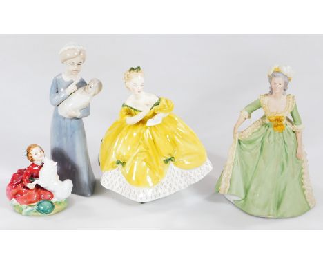 A Royal Doulton figure, Home Again, HN2167, printed marks beneath, 9cm H, another The Last Waltz, a Franklin Porcelain figure