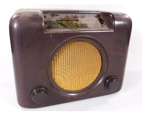 Vintage Bush Bakelite cased table radio,  with a mesh work speaker front and articulated tuning knops, 29cm H, 32cm W, 18cm D