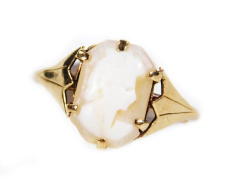 A cameo ring, claw set with oval profile, on a part pierced shank, marked 9ct, size M-N, 2g all in.