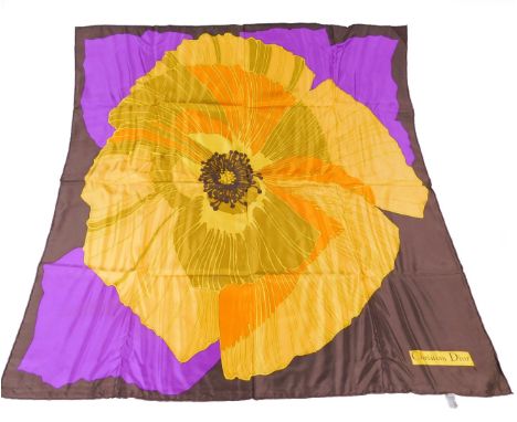 A mid 20thC Christian Dior silk scarf, in flowerhead pattern, predominately in yellow, orange and purple, 76cm x 76cm.
