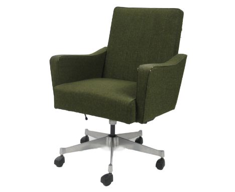 A 1960/70's vintage swivel armchair, in green material, on a spider leg chrome plated base, terminating in plastic capped fee
