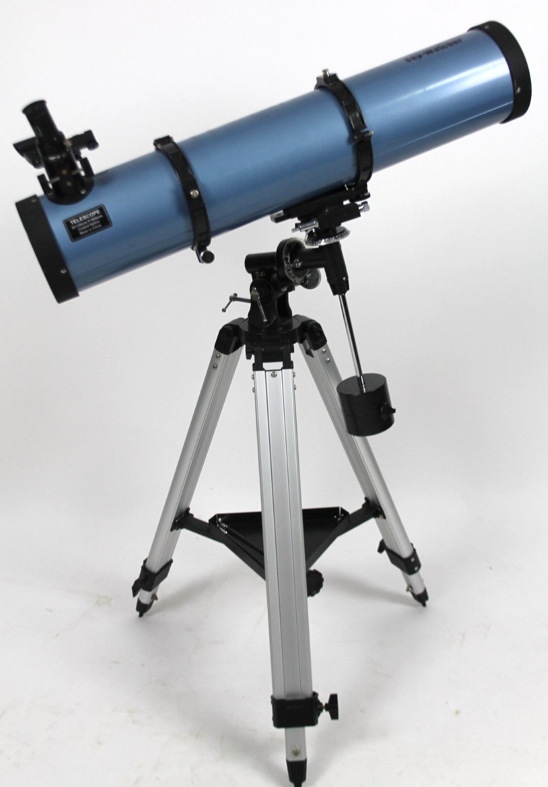 A Skywatcher telescope, in blue, on a tripod stand, 85cm W, D=130MM F