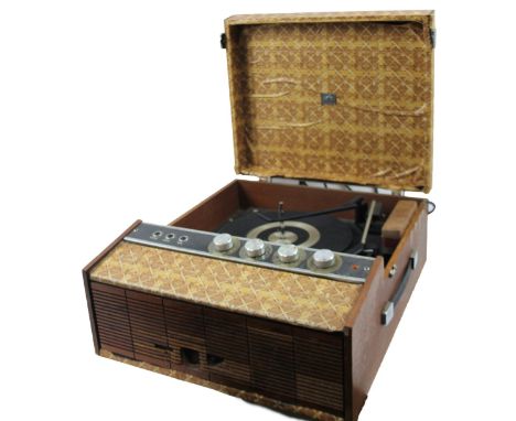 A BIB BRC vintage table top record player, with straw coloured paper covering, the hinged lid revealing a turn table, with ar