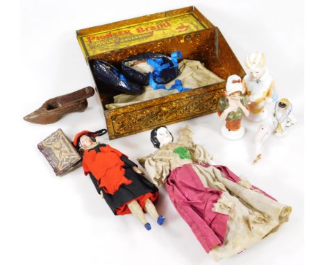 Various continental porcelain shoulder or half dolls, miniature London Almanack 1799, child's shoes, wooden snuff box shoe, 3