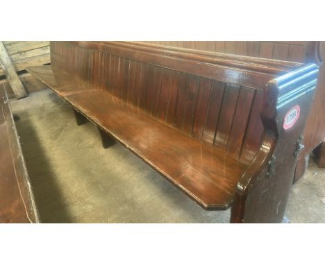 Church pew, missing one end, supported in the centre (one end propped up), 345cm L x 89cm H x 50cm D