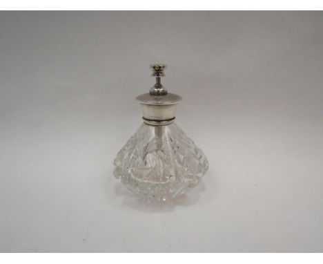 A white metal and glass perfume bottle, stamped Sterling Robinson &amp; Co Singapore &amp; Kuala Lumpur, engine turned detail
