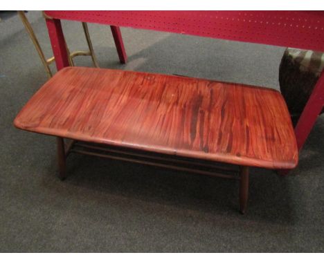 A 1960s Ercol elm coffee table, slatted undertier, heavily varnished to top, 35cm high x 105cm long x 46cm wide 