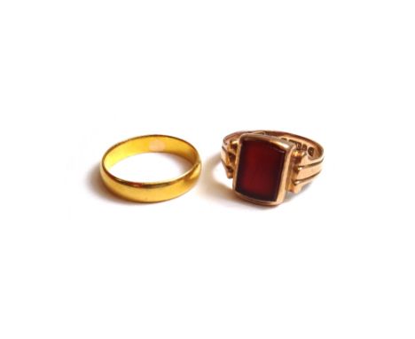 A 22ct gold plain wedding ring, weight 3.3 gms, ring size N and a 9ct gold and cornelian set signet ring, Chester 1898, ring 