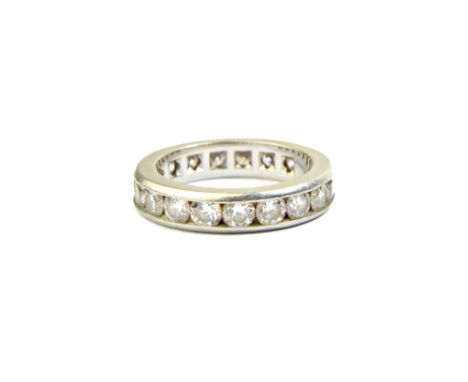 A Tiffany & Co platinum and diamond set full eternity ring, channel set with circular cut diamonds, detailed Tiffany & Co PT 