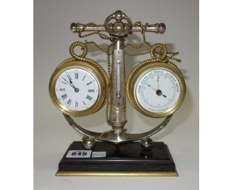 A silvered brass clock/barometer compendium, late 19th/early 20th century, the central anchor with applied thermometer, flank