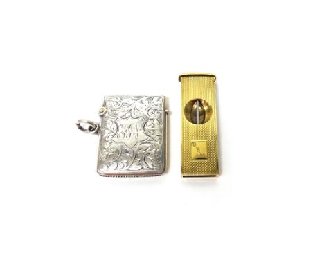 A 9ct gold cased rectangular slide action cigar cutter, with engine turned decoration, London, probably 1958 and a late Victo