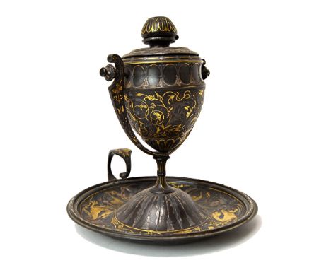 A Continental patinated metal oil lamp, 19th century, the burner body of urn form, on a gimble frame with a dished base and s