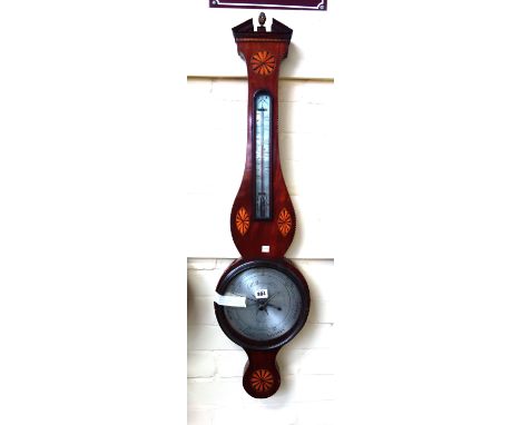 A mahogany and inlaid wheel barometer by 'B. Peurely Fecit, York', with broken arch pediment over an inset thermometer and si