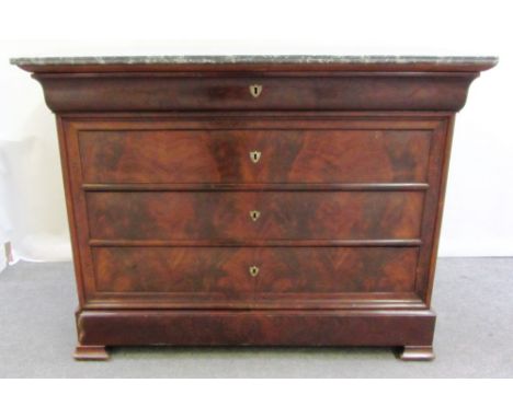 An early 19th century French commode, the marble top over a mahogany five drawer base, on block feet, 125cm wide.