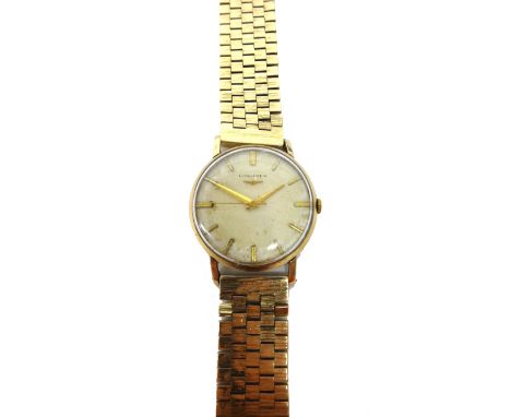 A gentleman's 9ct gold, circular cased Longines wristwatch, with a signed jewelled lever movement, the signed dial with gilt 