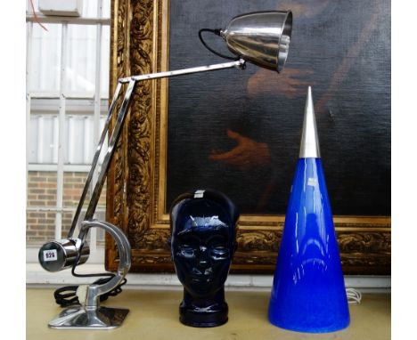 A modern chrome adjustable table lamp, another blue glass and white metal mounted table lamp of conical form, 53cm high, and 