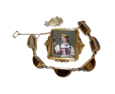 A gold mounted rectangular Swiss enamelled brooch, decorated with the portrait of a lady with a bird, the rectangular mount, 