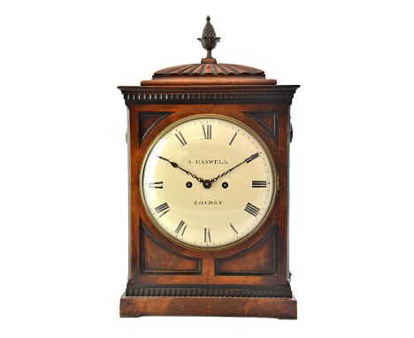 An early Victorian mahogany cased mantel clock, the eight inch white painted dial detailed 'A Haswell, London', with pineappl