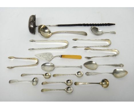 Silver and silver mounted flatware, comprising; four pairs of sugar tongs, a toddy ladle, having a twisted whalebone handle, 