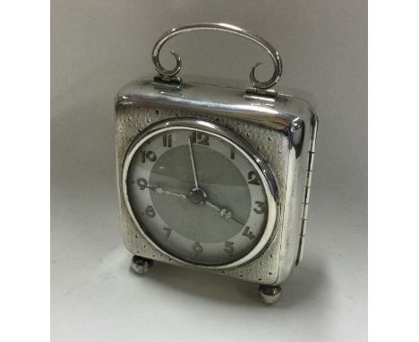 A large silver mantle clock with engine turned decoration. Birmingham. By William Neale. Approx. 265 grams. Est. £200 - £300.