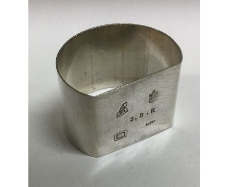 GUERNSEY: A silver napkin ring. By Bruce Russell. Approx. 37 grams. Est. £20 - £30.
