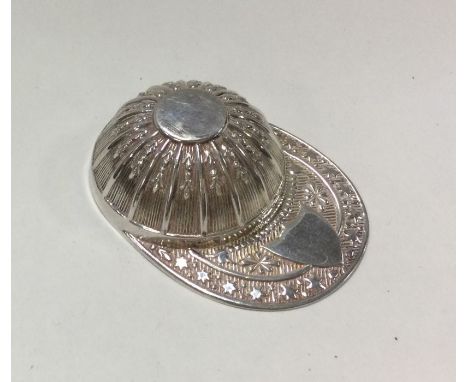 A silver jockey cap caddy spoon. Birmingham. Approx. 11 grams. Est. £35 - 345.