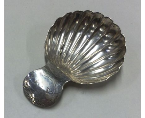 A George III silver caddy spoon. Birmingham 1813. Approx. 5 grams. Est. £20 - £30.