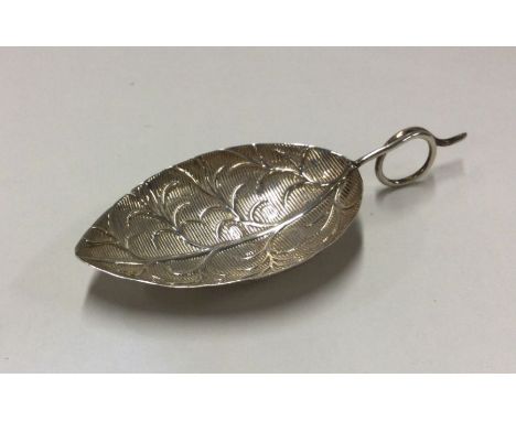 A George III silver caddy spoon in the form of a leaf. Birmingham 1798. By John Taylor. Approx. 6 grams. Est. £50 - £60.