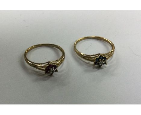 A pair of ruby, sapphire and diamond rings. Approx. 1.7 grams. Est. £30 - £50.