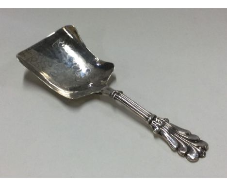 A Victorian silver caddy spoon with bright cut decoration. Birmingham. By George Unite. Approx. 8 grams. Est. £35 - £45.
