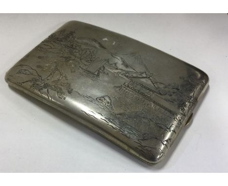 A large Japanese silver cigarette case decorated with rivers. Marked Sterling to interior. Approx. 126 grams. Est. £70 - £80.
