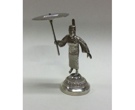A heavy silver figure of a Chinese man holding an umbrella. Approx. 56 grams. Est. £50 - £80.