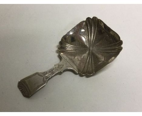 A silver caddy spoon with square bowl. Birmingham 1832. By T&amp;P. Approx. 8 grams. Est. £40 - £60.