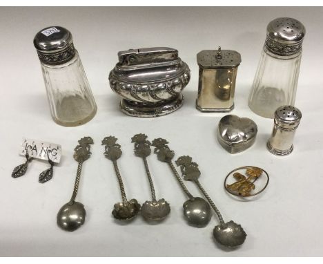 A collection of silver cruets together with a plated lighter etc. Est. £30 - £40.