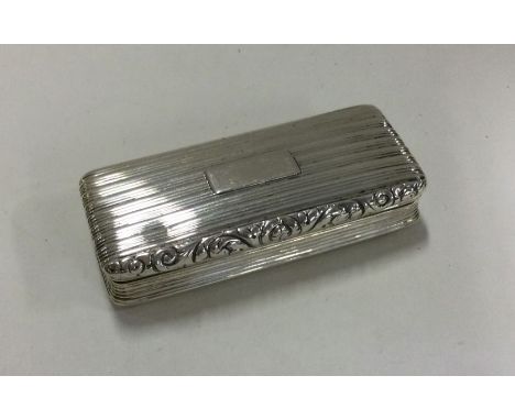 A rectangular silver snuff box. Birmingham 1825. By Joseph Wilmore. Approx. 44 grams. Est. £120 - £150.