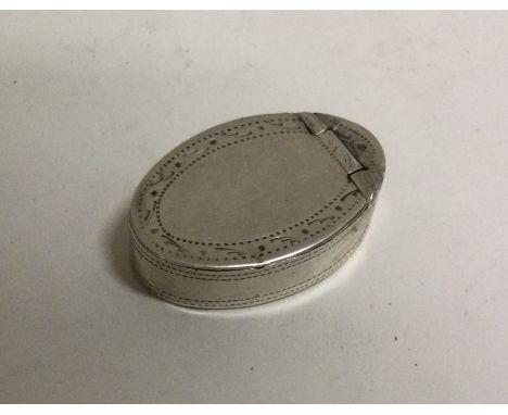 A Georgian silver patch box bearing import marks. Birmingham. By IT. Approx. grams. Est. £20 - £30.