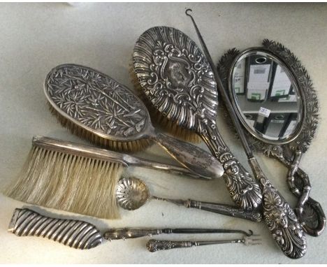 A Chinese silver brush together with a mirror etc. Est. £30 - £40.