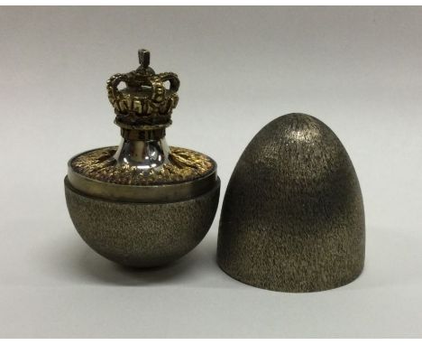 STUART DEVLIN: A good cased silver 'surprise' egg of typical form. Approx. 123 grams. Est. £350 - £450.