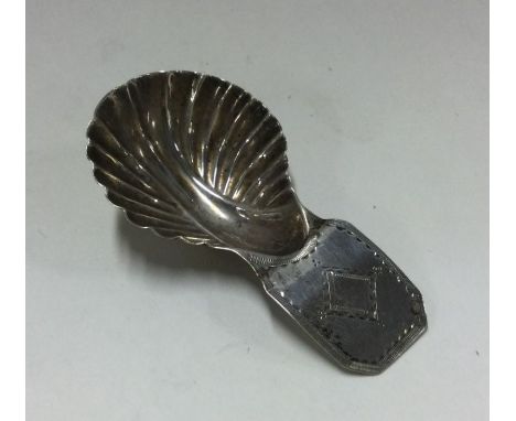 A Georgian silver caddy spoon. London 1832. Approx. 7 grams. Est. £25 - £35.